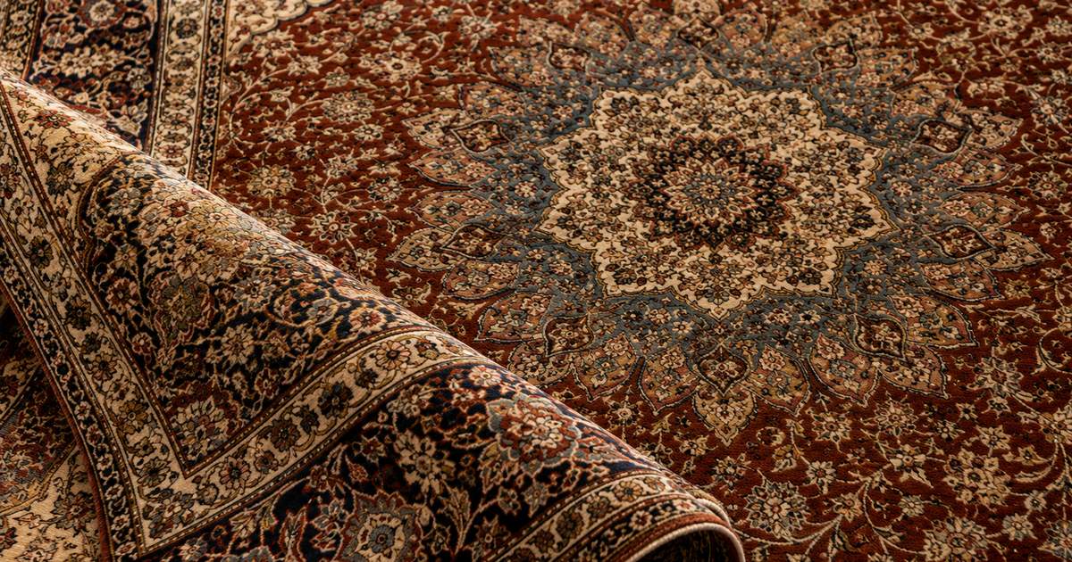 Fine Persian Tabriz rug with a central medallion framed by the Mahi (Herati) fish-and-rosette pattern